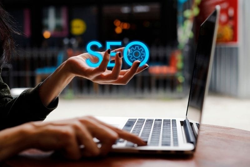 SEO keyword displayed on a laptop for search engine optimization strategy