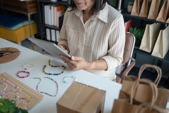 Singapore SME owner preparing handmade products and packaging customer orders